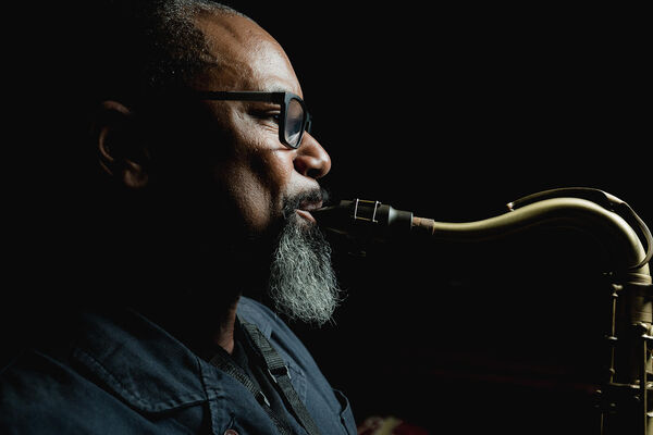 Denys Baptiste close up playing tenor sax