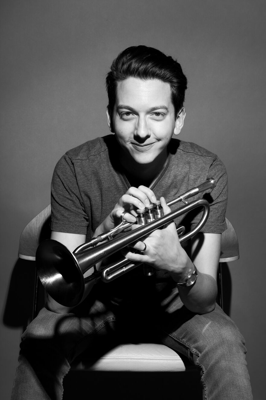 Freddie Gavita Holding Trumpet