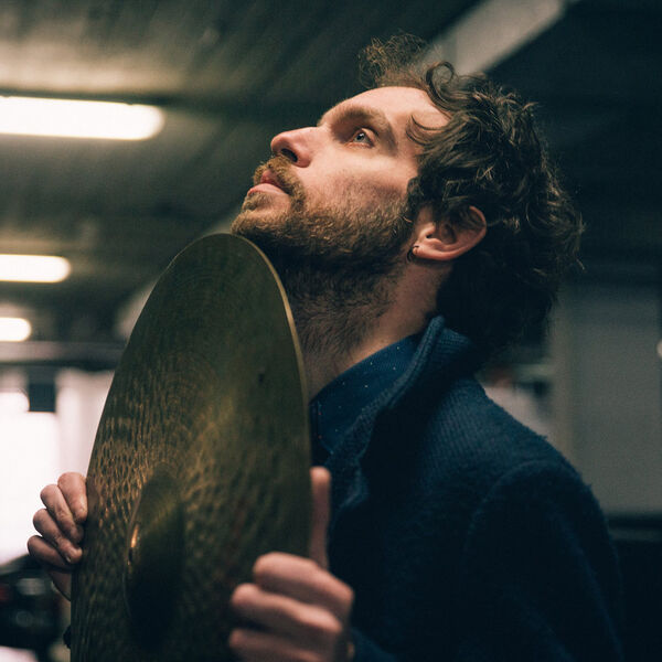 Billy Pod holding cymbal