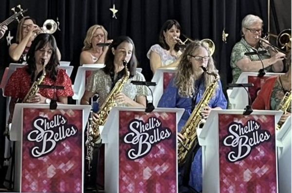 Shell's Belles Swing Band playing on stage